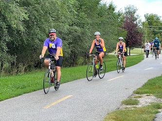 F&G Employees biking in a Pedal for the Pantry fundraiser.