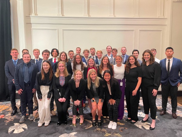 The full intern cohort dressed in business attire